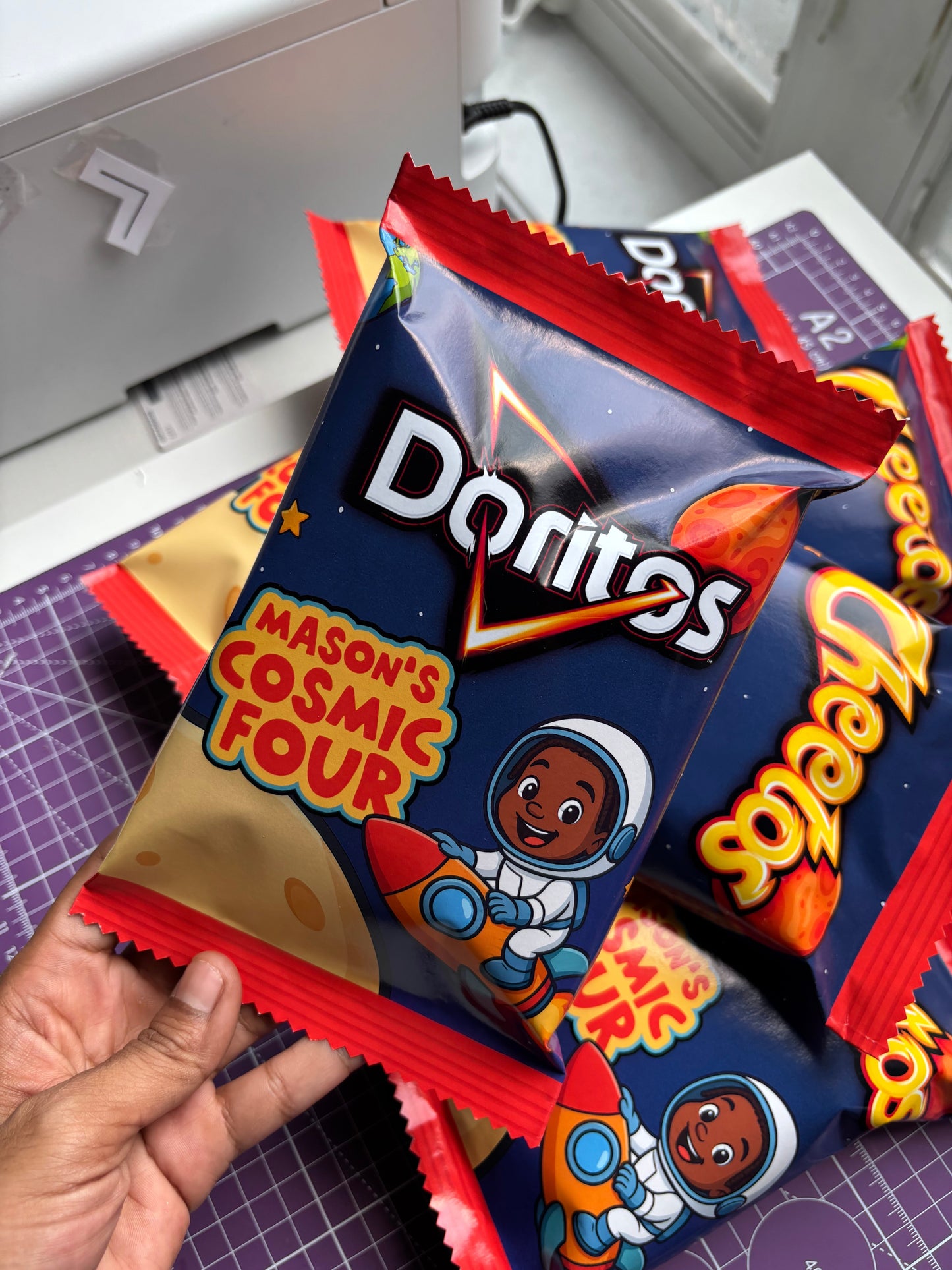 Custom Doritos kids birthday chip bags solar system space rocketship cartoon style party favors on the moon